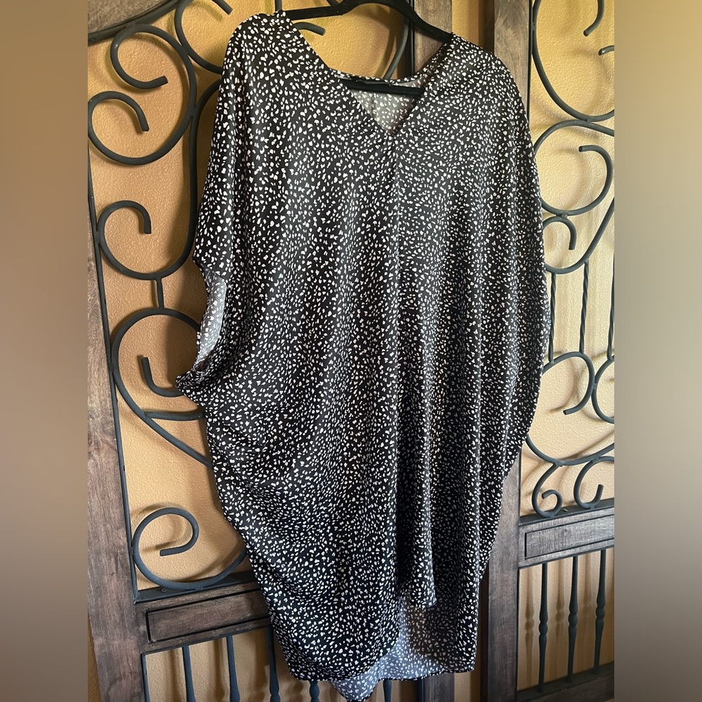 Hatch shrug maternity dress. Black with light pink spattering.